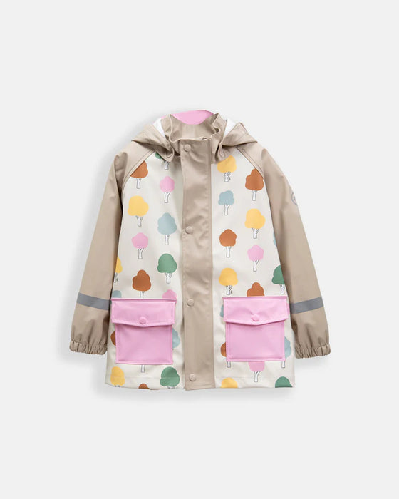 Children’s rain jacket with colorful tree prints and pink pockets displayed on a plain background.