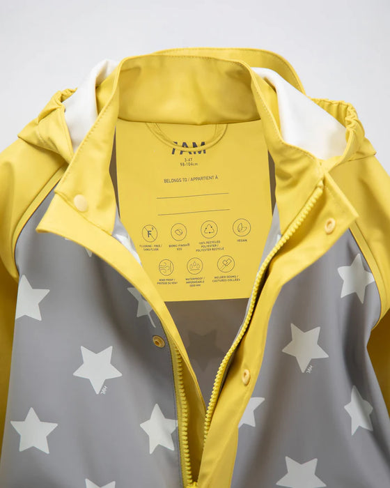 7AM rain jacket for kids in yellow and grey with white star pattern, shown unzipped on a flat surface.