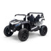 Kids' ride-on racing car in black and white with two seats, shown on a white background.