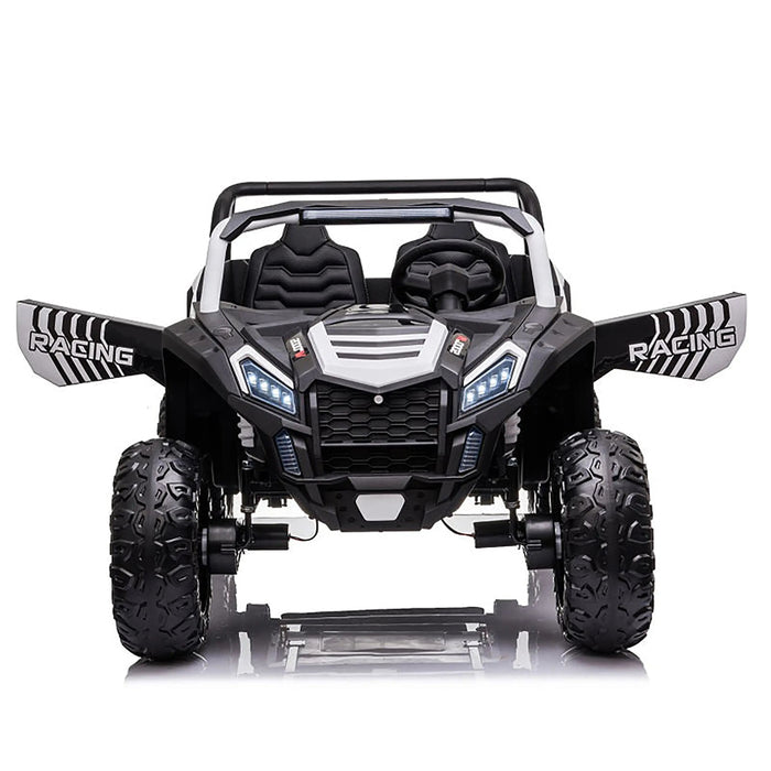 Kids ride-on racing truck toy in black and white, shown from the front on a white background.