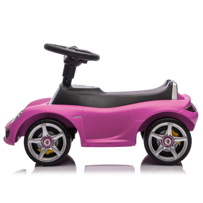 Pink ride-on toy car for kids shown in profile on a white background.