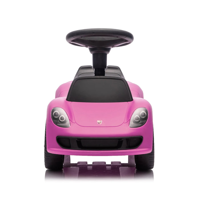 Pink ride-on toy car for kids shown from the front on a white background.