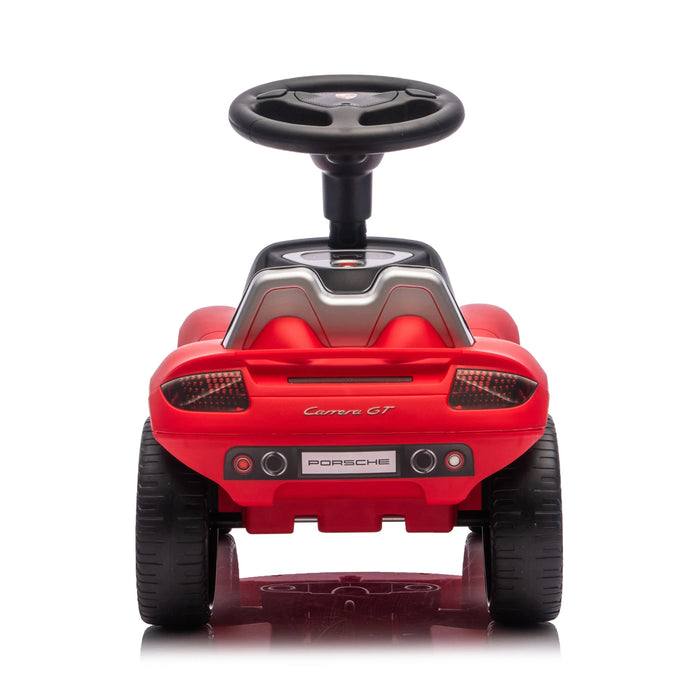 Red Porsche Carrera GT ride-on toy car shown from the rear on a white background.