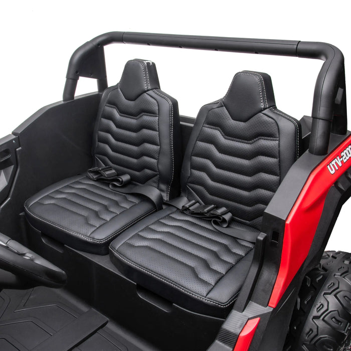 UTV-200 kids ride-on car with two black leather seats and safety belts in a red frame.