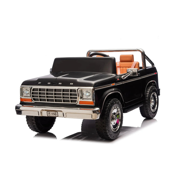 Ford F-150 black ride-on toy truck with tan seats displayed on a white background.
