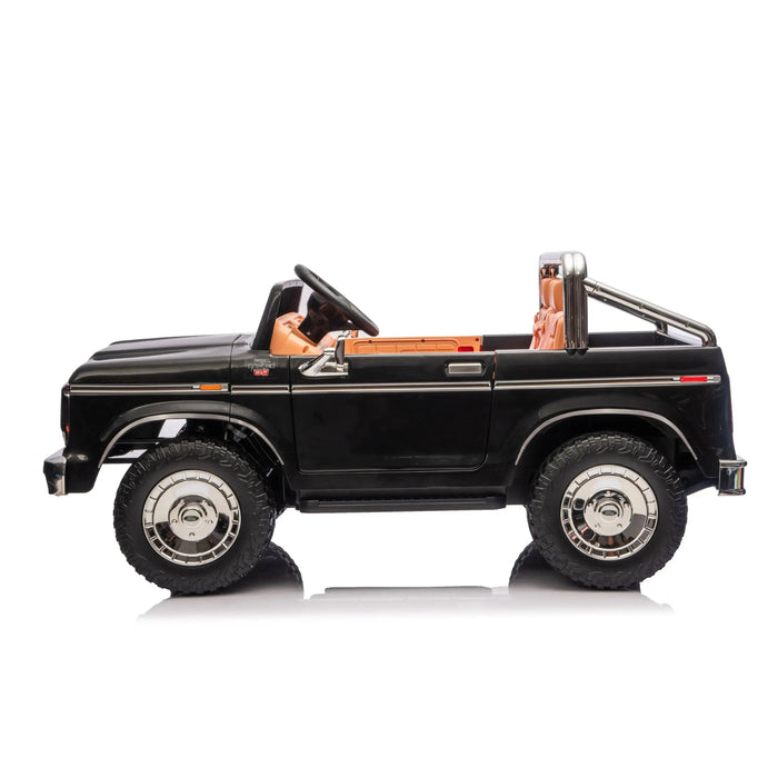 Ride-on black toy car for kids shown from the side on a white background.