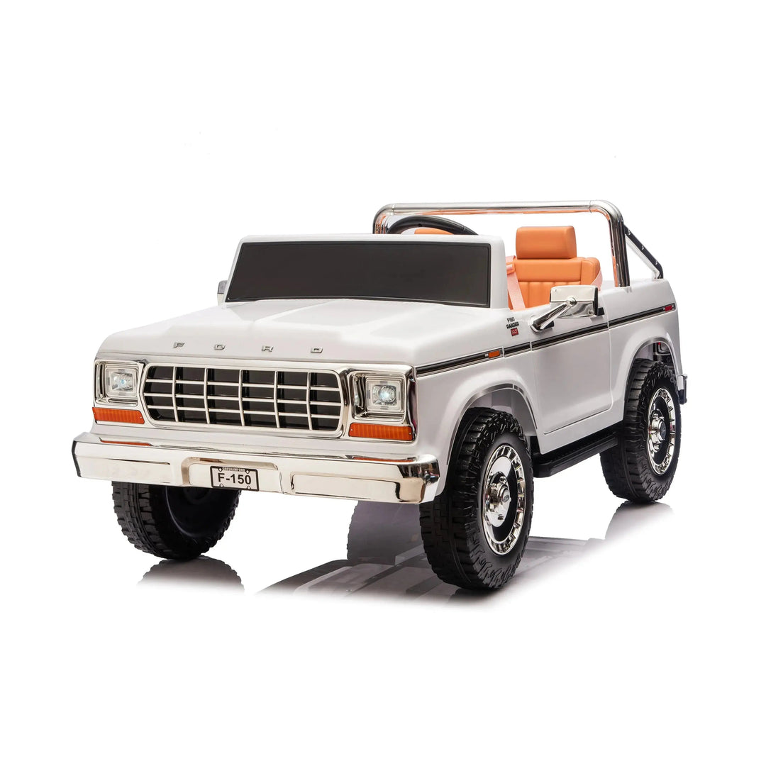 White Ford F-150 kids ride-on toy car with brown seats shown on a white background.