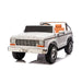 White Ford F-150 kids ride-on toy car with brown seats shown on a white background.