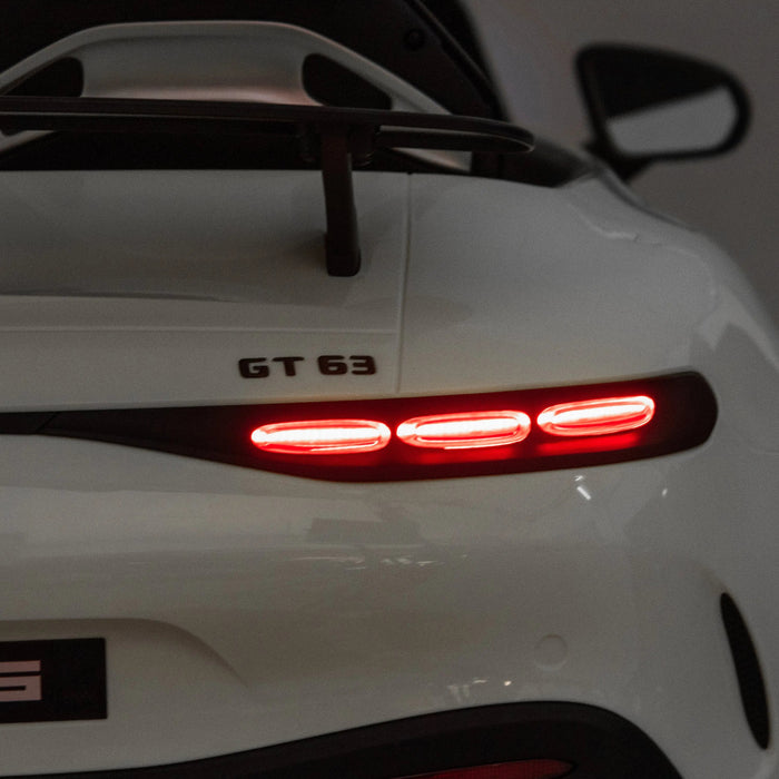 GT 63 kids ride-on car shown from the rear with illuminated tail lights in an indoor setting.