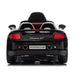 Porsche Carrera GT ride-on toy car in black shown from the rear with red tail lights visible.