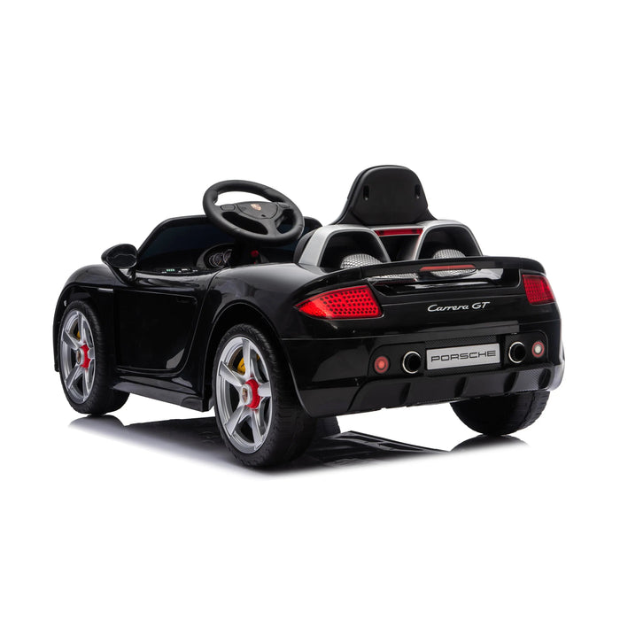 Porsche Carrera GT black ride-on toy car for kids, shown from rear angle on white background.