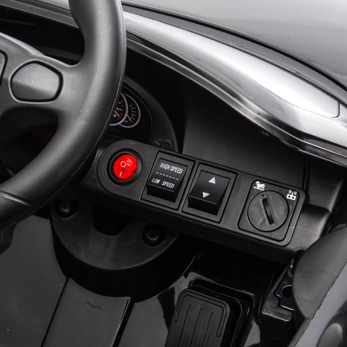 Kids’ ride-on toy car dashboard with steering wheel, speed controls, and ignition switch visible.