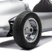 Children’s silver ride-on car close-up showing detailed front wheel and side body design.