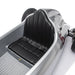 Children’s ride-on race car seat detail in silver with safety belt and number 5 on side.
