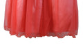 Coral glitter dress with sheer tulle skirt detail shown against a white background.