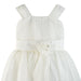 Ivory flower girl dress with tulle skirt and floral sash detail shown on a white background.