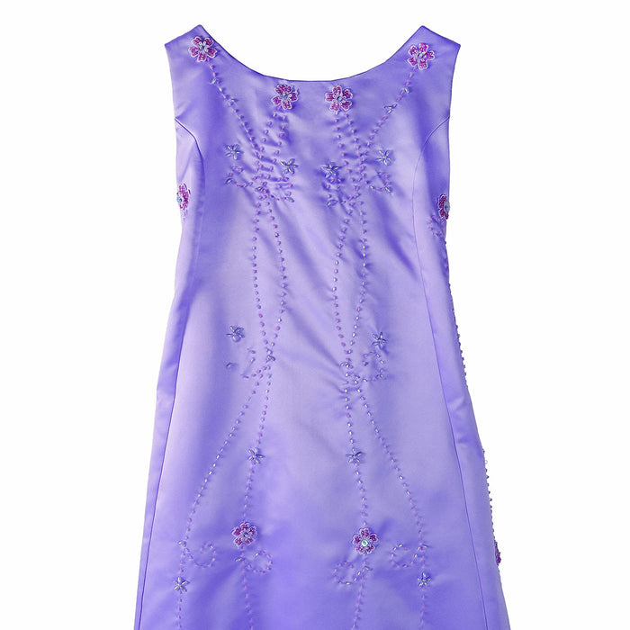 Lilac flower girl party dress with floral embroidery shown on a white background.