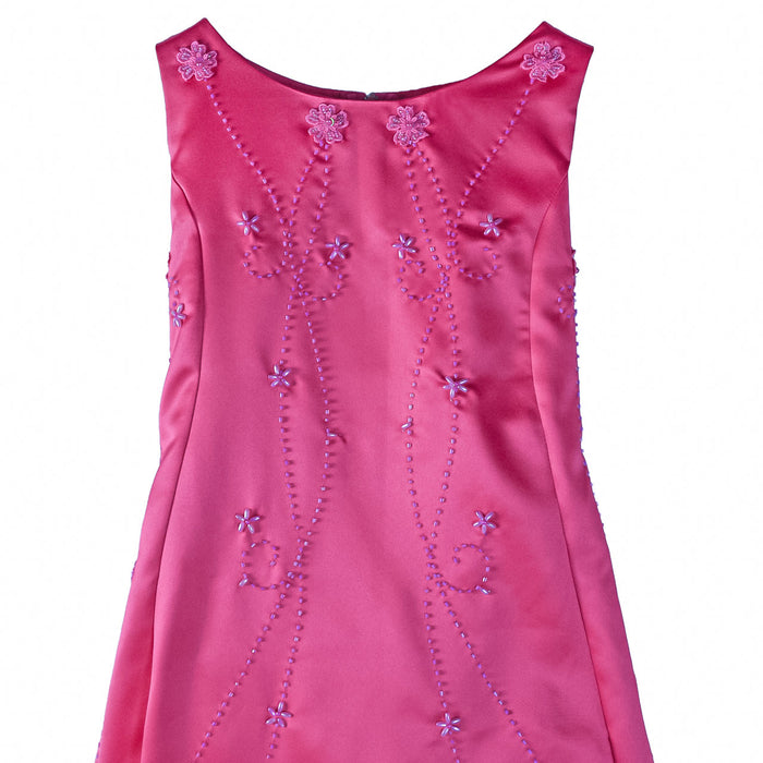 Magenta flower girl party dress with floral embroidery shown against a white background.