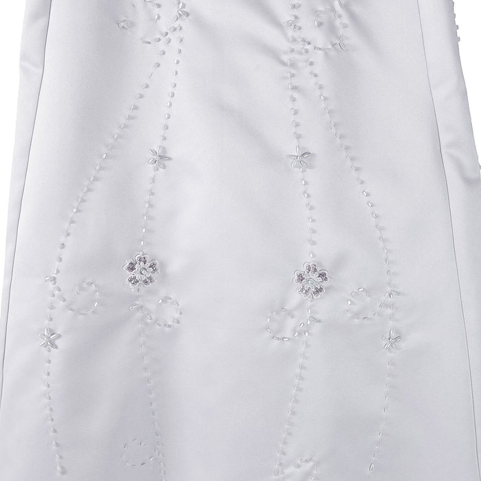 Flower girl party dress with white satin fabric and delicate floral embroidery details shown up close.
