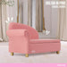 Pink Barbie chaise lounge for kids in a stylish living room, gold legs, decorative mirror.
