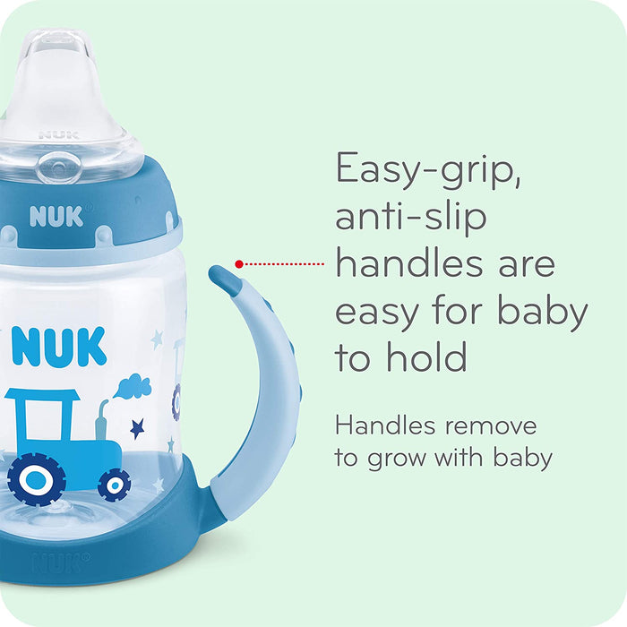 NUK baby sippy cup with blue easy-grip handles shown on a light background, features tractor design.