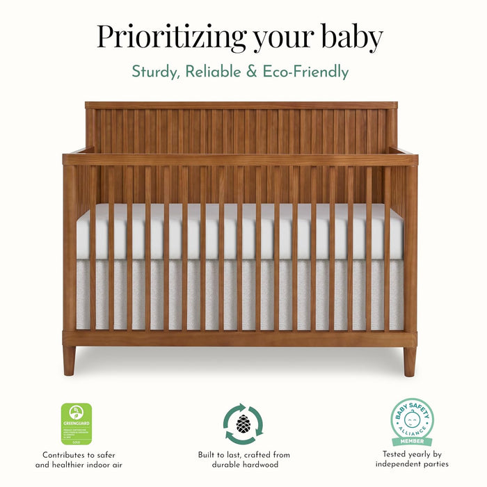 Eco-friendly wooden baby crib with safety certifications and a white mattress