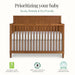 Eco-friendly wooden baby crib with safety certifications and a white mattress