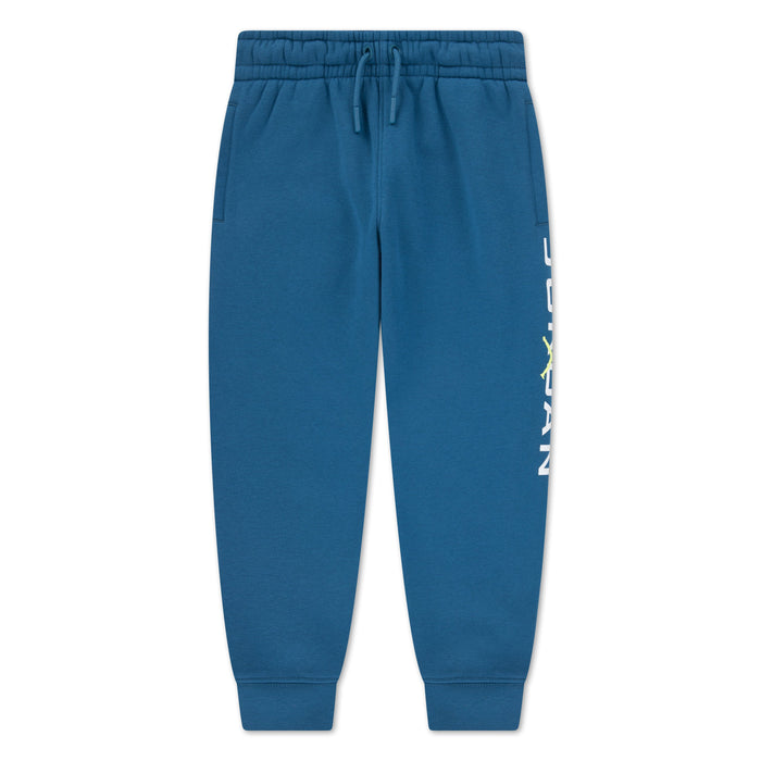 Blue Jordan kids' sweatpants with elastic waistband and side pockets, laid flat on white background.