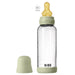 BIBS baby bottle with silicone nipple and green cap shown upright on a white background.