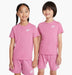 Nike kids' pink t-shirt and shorts sets worn by two children standing against a white background.