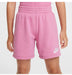 Nike kids' pink shorts with logo, shown worn by a child against a neutral background.