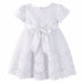 Baby white dress with lace trim and satin bow, displayed flat against a white background.