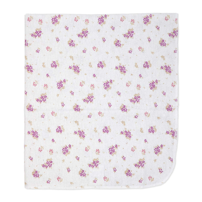 White baby muslin blanket with small purple floral print, shown flat on a white background.