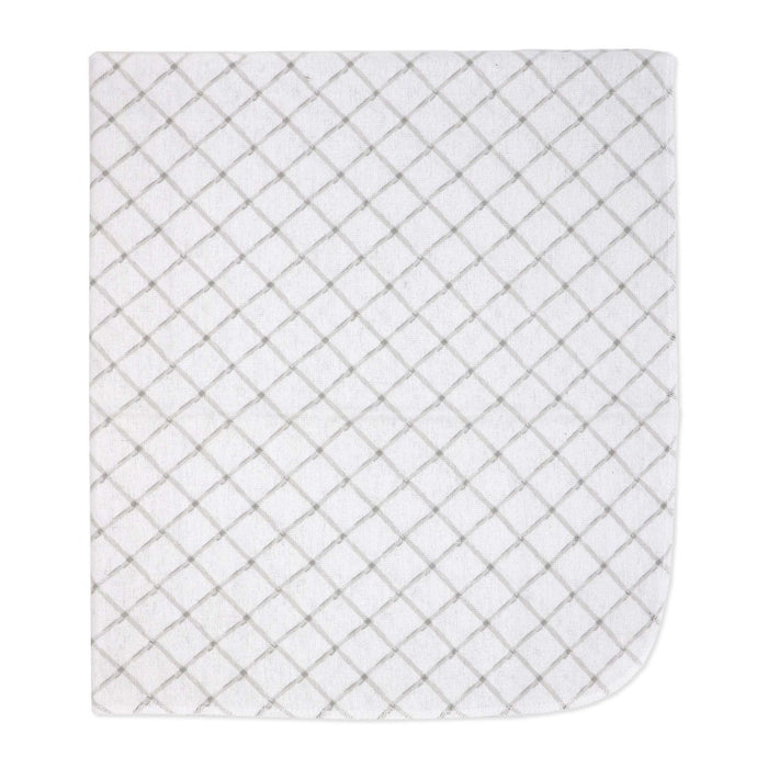 White quilted baby blanket with grey diamond pattern shown flat on a white background.