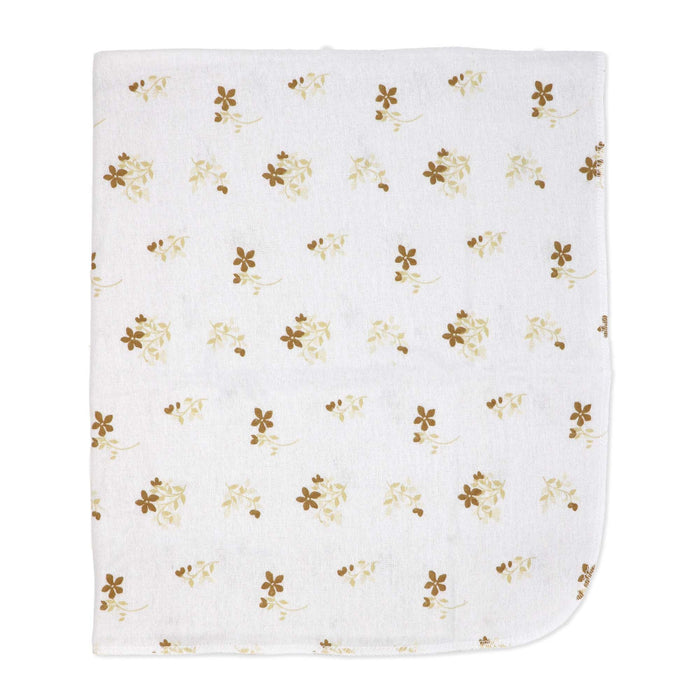 White baby blanket with small brown and beige floral pattern laid flat on a plain background.