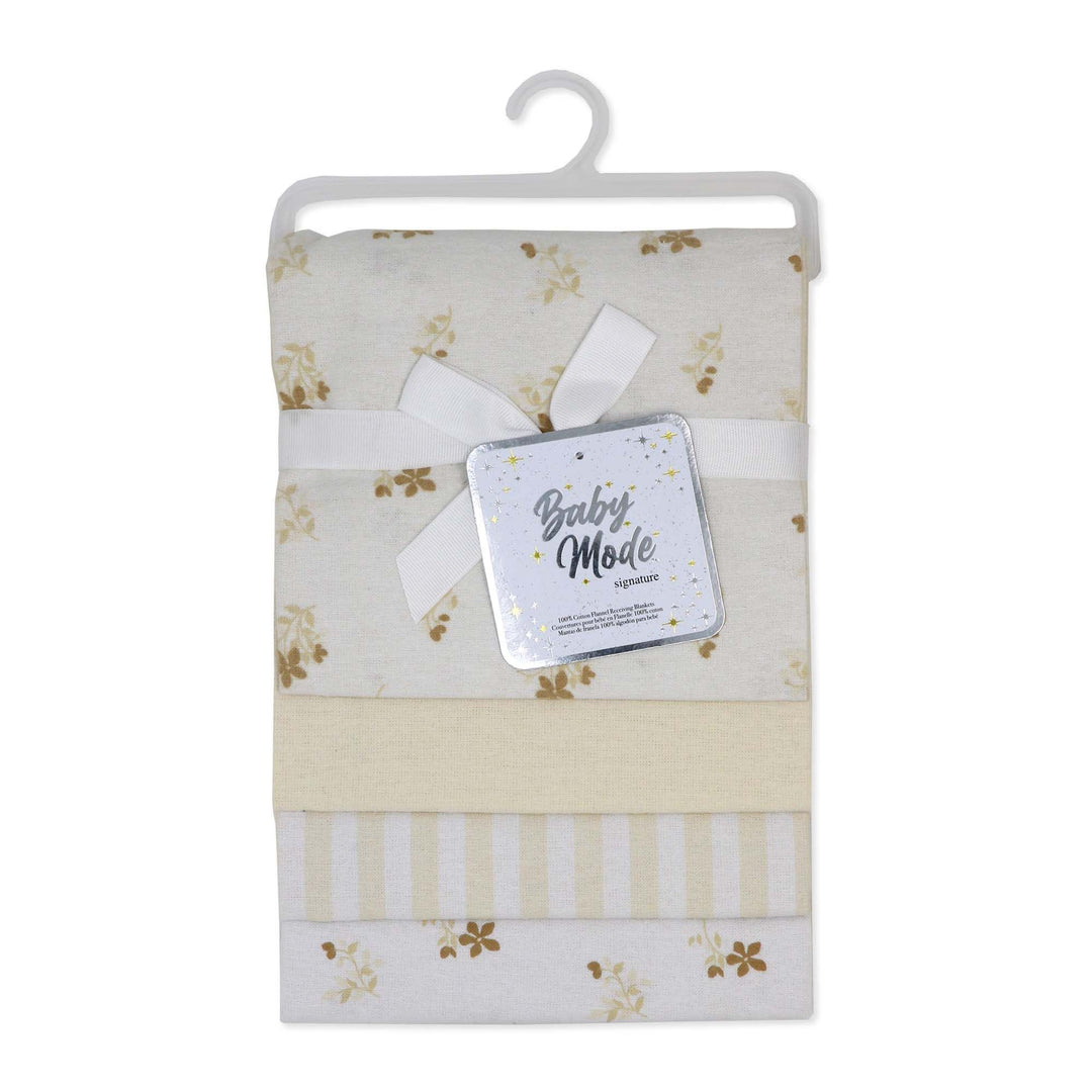 Baby Mode signature crib sheet set in beige floral print, folded on a hanger with a gift tag.