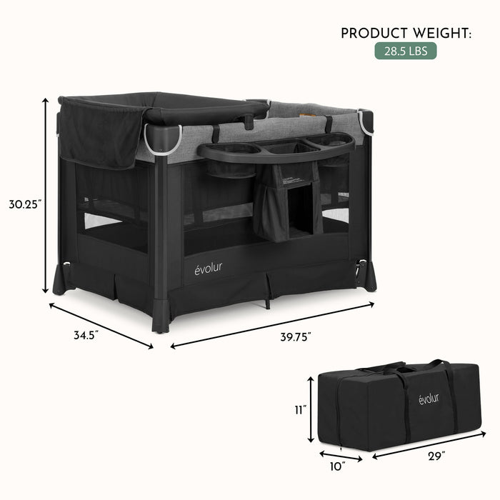 Black and grey portable baby playard with changer and storage, labeled with dimensions and weight.
