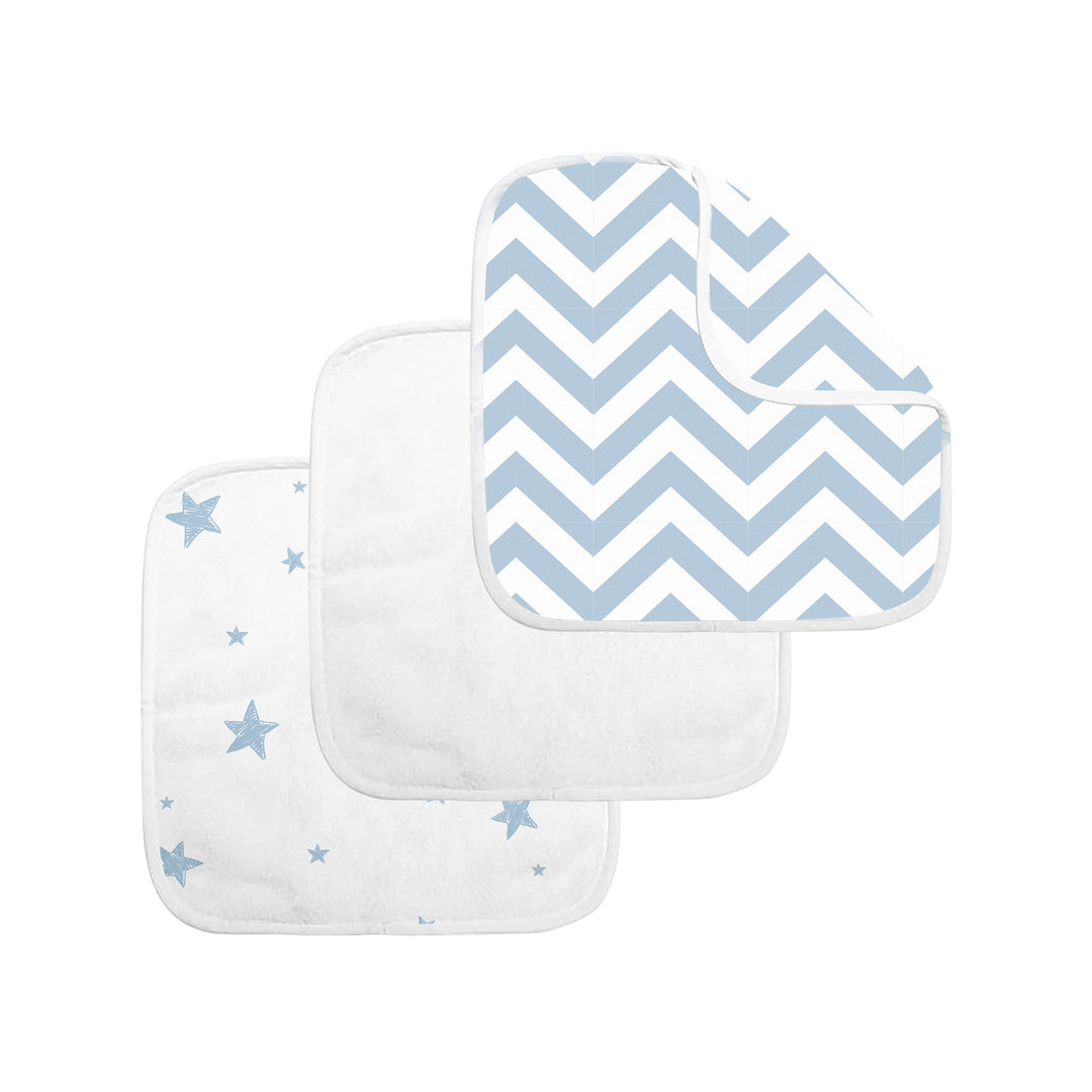 Set of three baby washcloths with blue chevron and star patterns on white background