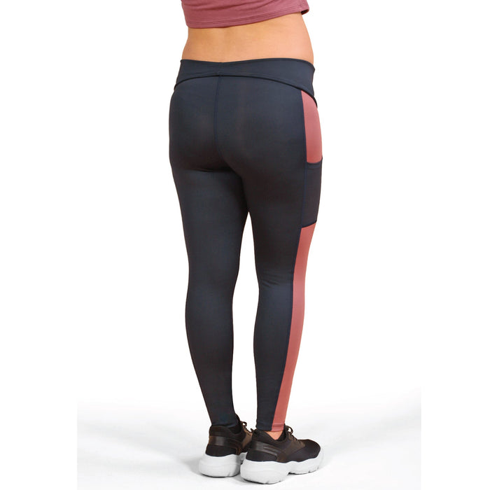 Athena Duo black leggings with pink side panels shown on a person standing against a white background.