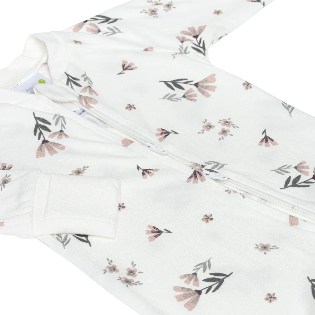 White bamboo baby sleeper with pink and grey floral print and front zipper