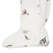 Close-up of white baby sleeper foot with soft pink and grey floral print