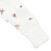 White baby sleeper sleeve with soft pink floral print and ribbed cuff