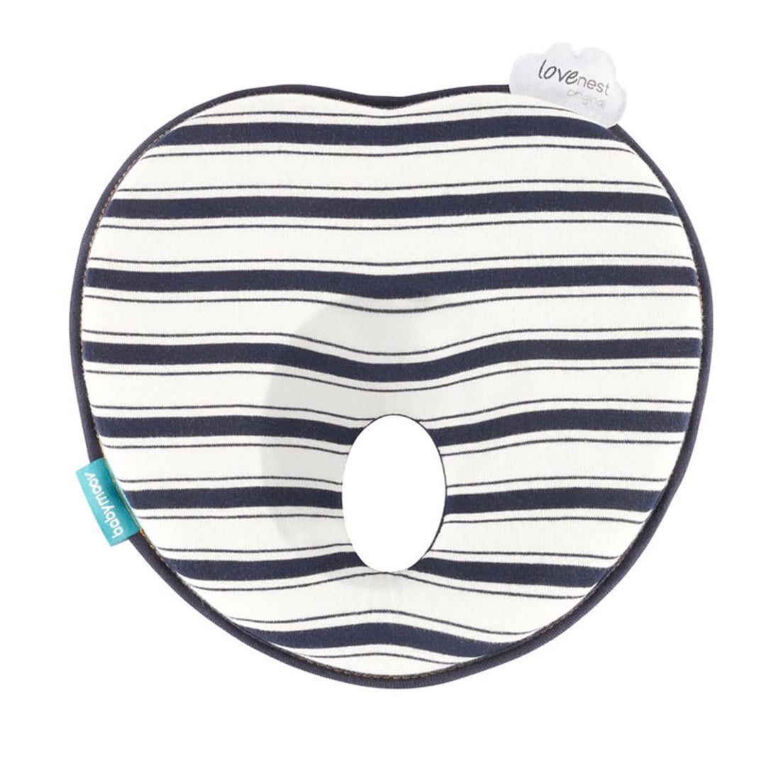 Striped baby head shaping pillow with ergonomic design and central hole for infant support