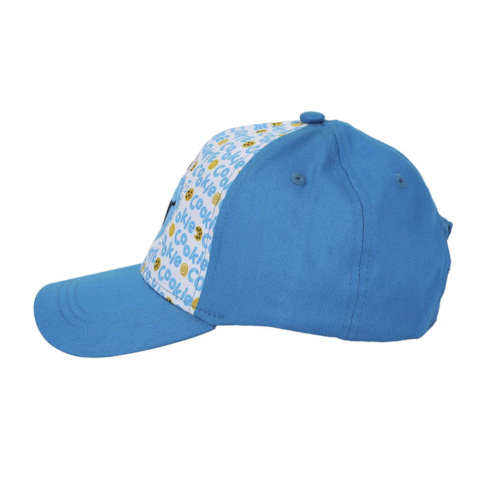 Bioworld Sesame Street Cookie Monster ballcap in blue with cookie print, shown in side view on white background.