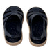 Boatilus Bioty kids sandals in navy blue with tan soles, shown from above on a white background.