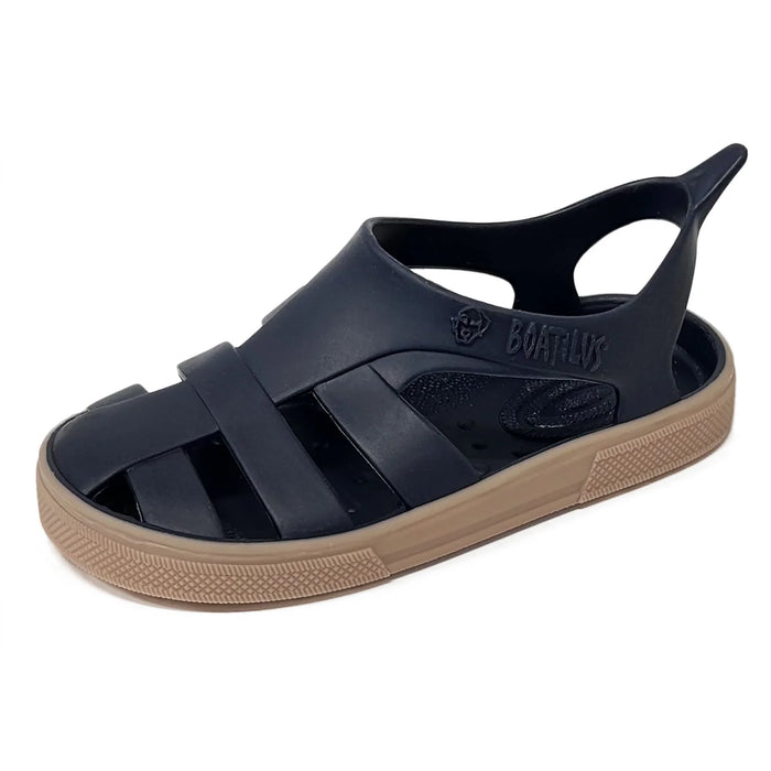 Boatilus Bioty kids sandal in navy blue with a tan sole shown on a plain white background.