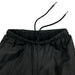 Conifere polar fleece-lined winter pants showing elastic waistband and drawstring close-up.