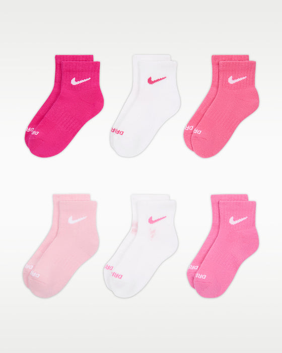 Nike kids’ quarter socks in pink and white, six pairs displayed on a white background.