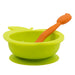 Yellow silicone baby bowl with suction base and orange baby spoon