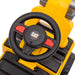 CAT ride-on toy steering wheel and dashboard featuring black and yellow plastic construction.